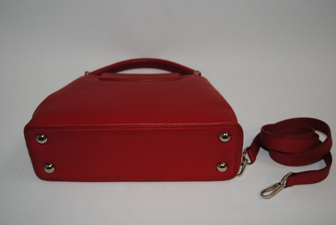 red taurillion leather Louis Vuitton Capucines Nano, measures 6.4 × 4.3 × 2.6 inches (16.3 × 10.9 × 6.6 cm).