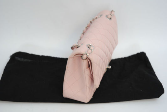 pink Chanel classic double flap, 25 cm width × ~16 cm height × ~7 cm depth (≈10″ × 6.3″ × 2.75″)
