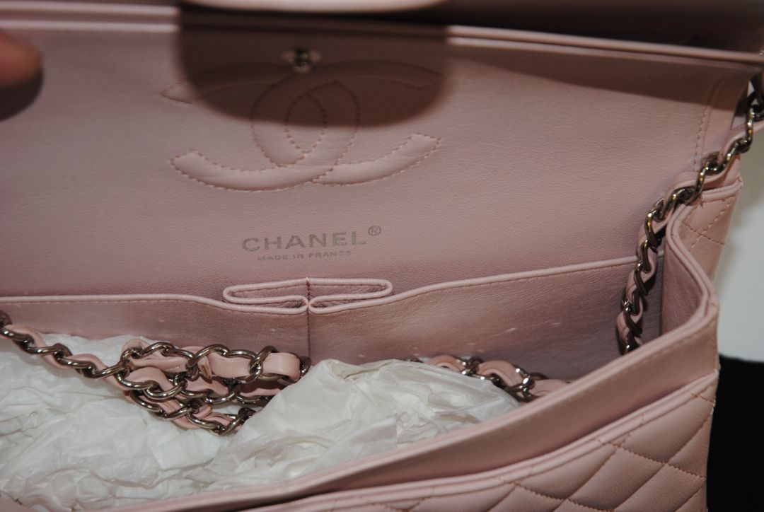 pink Chanel classic double flap, 25 cm width × ~16 cm height × ~7 cm depth (≈10″ × 6.3″ × 2.75″)