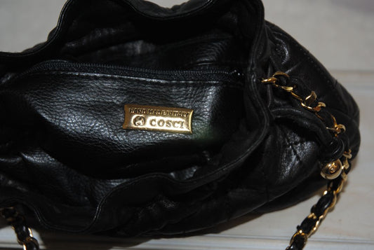 black and gold Cosci Lambskin leather bag, Width: ~7 in (18 cm) Height: ~6 in (15 cm) Depth: ~4 in (10 cm) Strap Drop: ~20–22 in (shoulder or crossbody)
