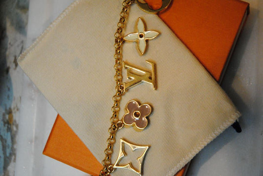 gold Louis Vuitton bag chain extender