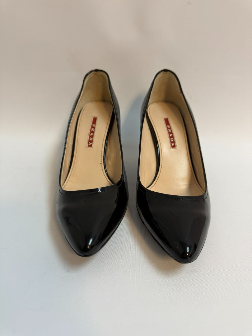 black Prada patent heels