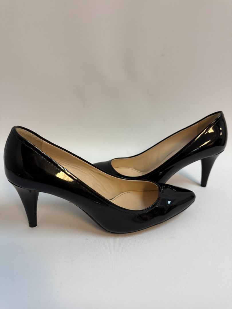 black Prada patent heels