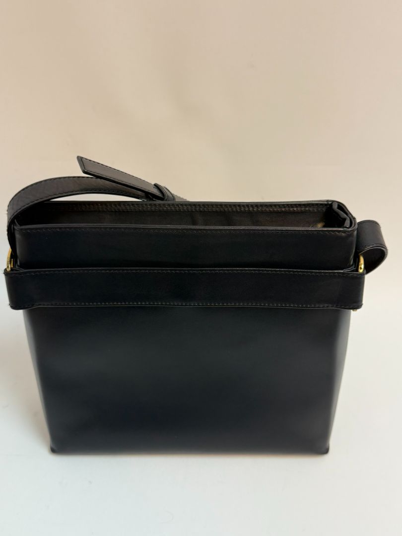 navy blue Ferragamo shoulder bag, Dimensions (Approximate): Height: 9” (22.9 cm) Width: 11.5” (29.2 cm) Depth: 4” (10.2 cm) Strap Drop: Adjustable from 10” to 13” (25.4 to 33 cm)