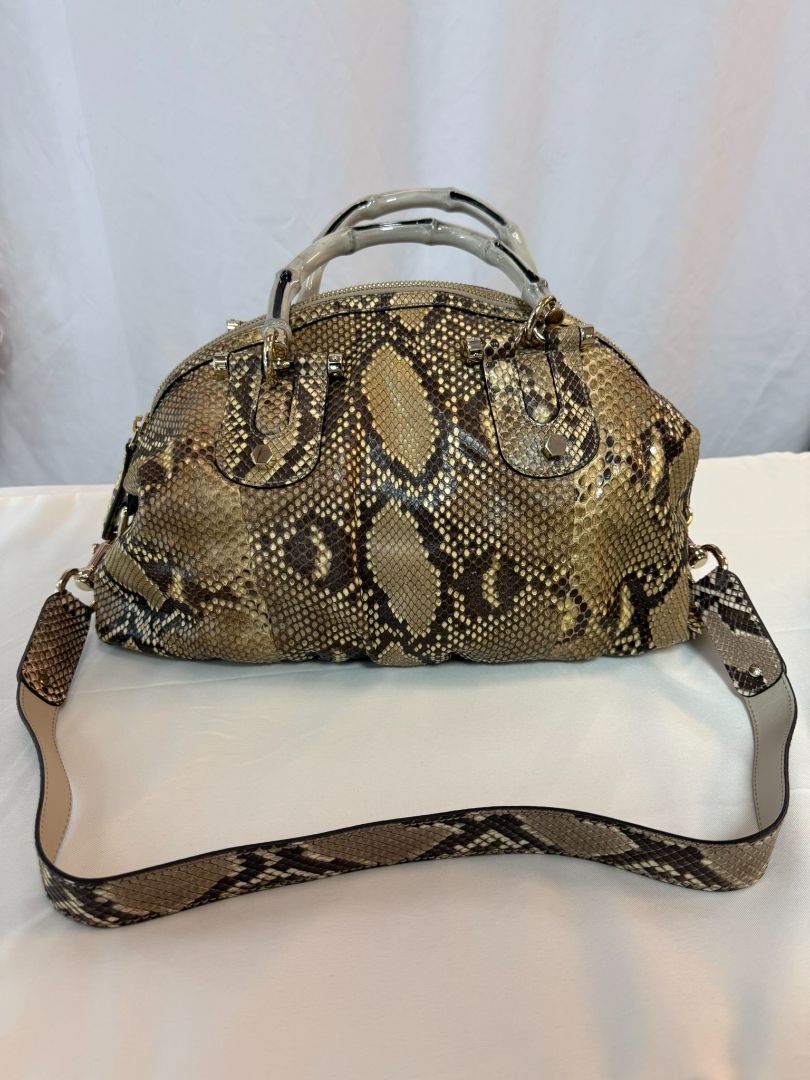 Taupe/ brown / beige Gucci Dome Pytho Satchel with Lucite Handles, Height: 9 in (22.8 cm) Width: 13.5 in (34.3 cm) Depth: 6 in (15.2 cm) Handle Drop: 5 in (12.7 cm) Strap Drop (detachable): approx. 18 in (45.7 cm)