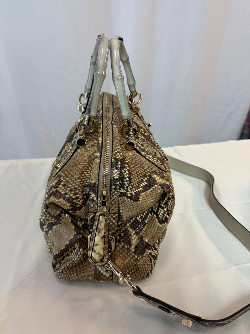 Taupe/ brown / beige Gucci Dome Pytho Satchel with Lucite Handles, Height: 9 in (22.8 cm) Width: 13.5 in (34.3 cm) Depth: 6 in (15.2 cm) Handle Drop: 5 in (12.7 cm) Strap Drop (detachable): approx. 18 in (45.7 cm)