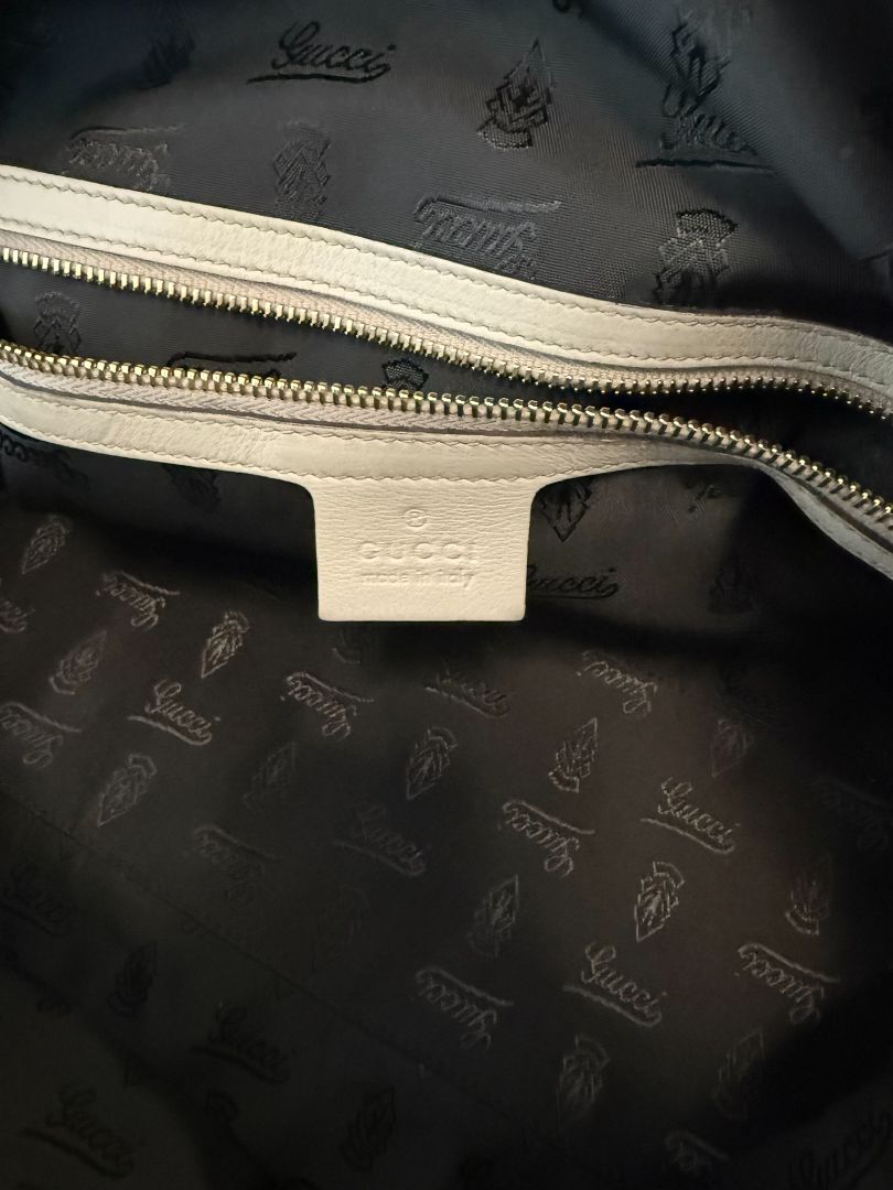 Taupe/ brown / beige Gucci Dome Pytho Satchel with Lucite Handles, Height: 9 in (22.8 cm) Width: 13.5 in (34.3 cm) Depth: 6 in (15.2 cm) Handle Drop: 5 in (12.7 cm) Strap Drop (detachable): approx. 18 in (45.7 cm)