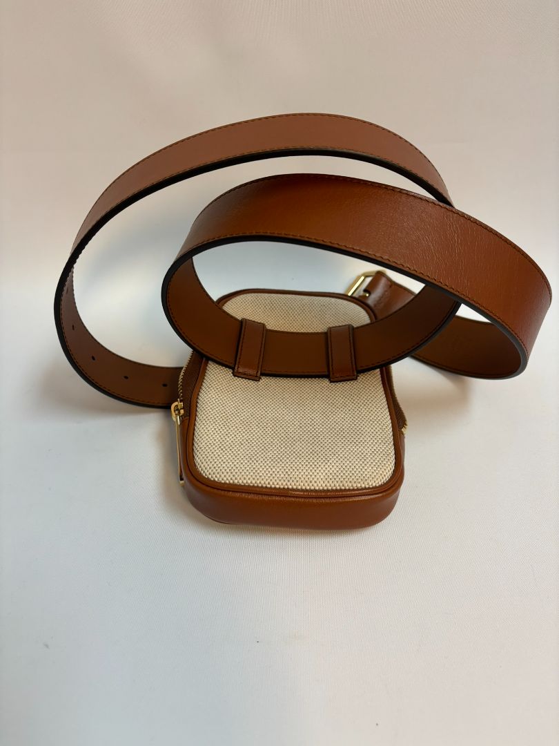 tan and white Gucci belt bag, 4x 6.5 x 1