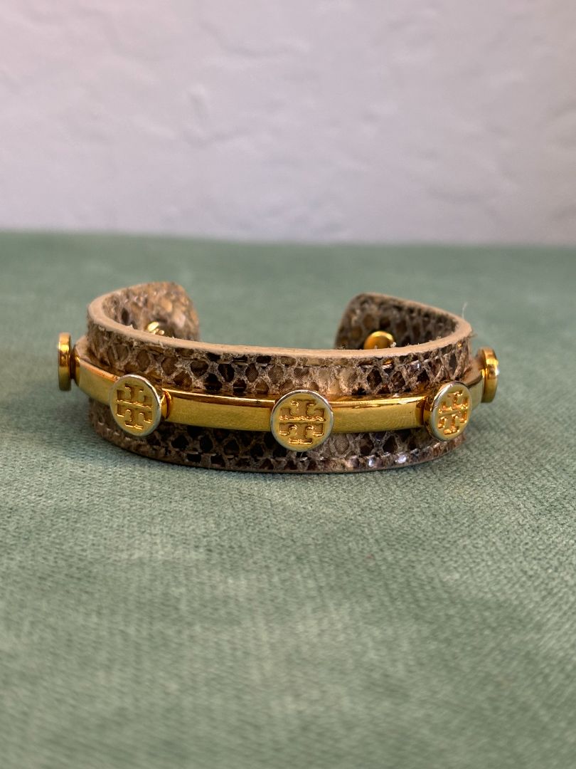 gold and tan Tory Burch snake skin cuff