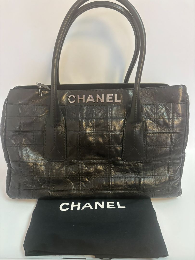 black Chanel tote, Dimensions (Estimated): Length: 14 in Height: 10 in Depth: 5.5 in Handle Drop: 7 in