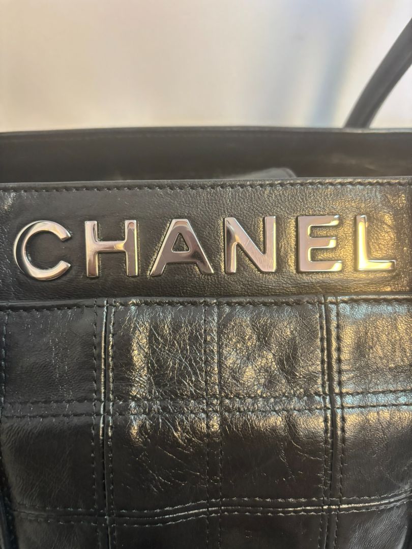 black Chanel tote, Dimensions (Estimated): Length: 14 in Height: 10 in Depth: 5.5 in Handle Drop: 7 in