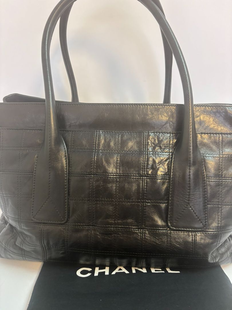 black Chanel tote, Dimensions (Estimated): Length: 14 in Height: 10 in Depth: 5.5 in Handle Drop: 7 in