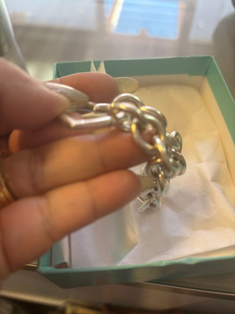 sterling silver Tiffany & CO link bracelet, π Dimensions (approx.): Length: 7.5 inches Width (each link): ~0.5 inches Heart clasp: ~0.75 inches wide
