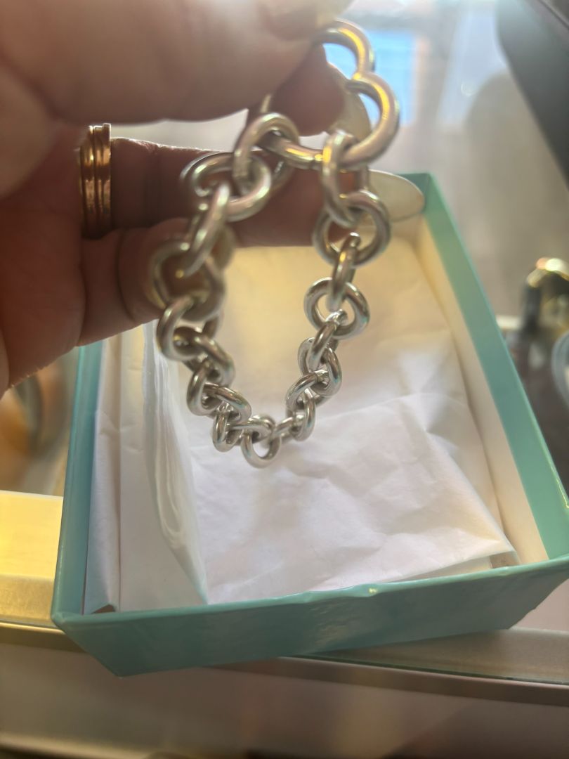 sterling silver Tiffany & CO link bracelet, π Dimensions (approx.): Length: 7.5 inches Width (each link): ~0.5 inches Heart clasp: ~0.75 inches wide