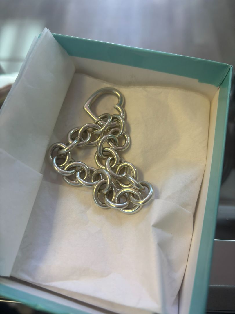 sterling silver Tiffany & CO link bracelet, π Dimensions (approx.): Length: 7.5 inches Width (each link): ~0.5 inches Heart clasp: ~0.75 inches wide