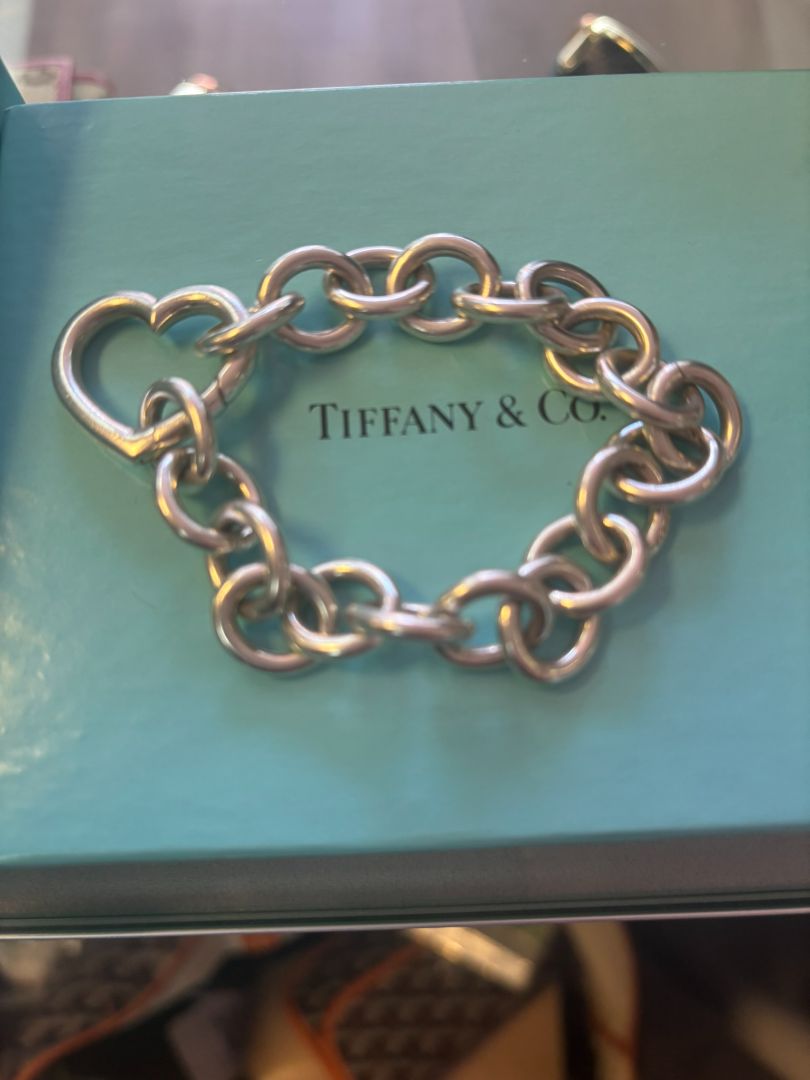 sterling silver Tiffany & CO link bracelet, π Dimensions (approx.): Length: 7.5 inches Width (each link): ~0.5 inches Heart clasp: ~0.75 inches wide