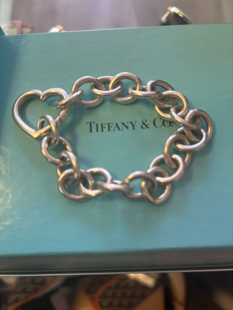 sterling silver Tiffany & CO link bracelet, π Dimensions (approx.): Length: 7.5 inches Width (each link): ~0.5 inches Heart clasp: ~0.75 inches wide