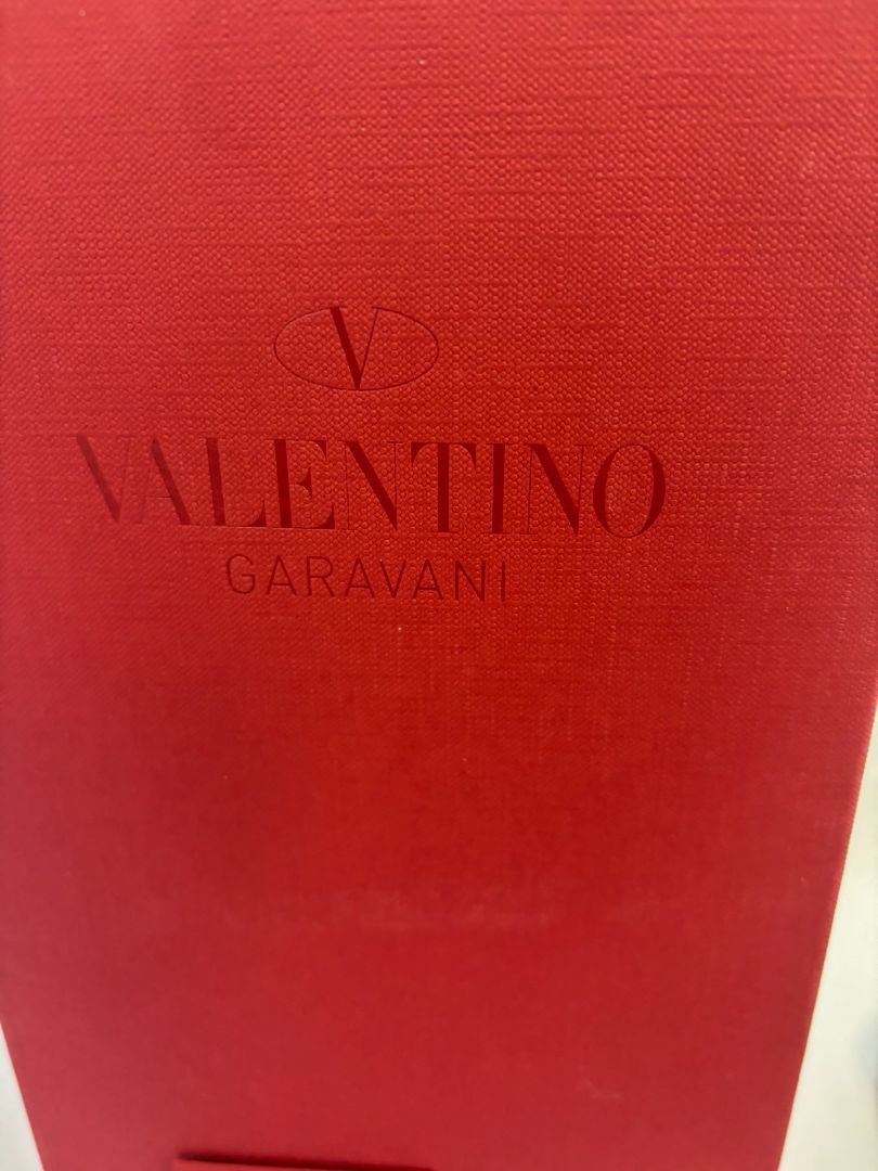 silver Valentino Garavani Rockstud Jelly Bow Thong Sandals, 37/ DIMENSIONS (Size EU 39 / US 9) Footbed Length: ~10.5 in Heel Height: Flat (~0.25 in molded heel)