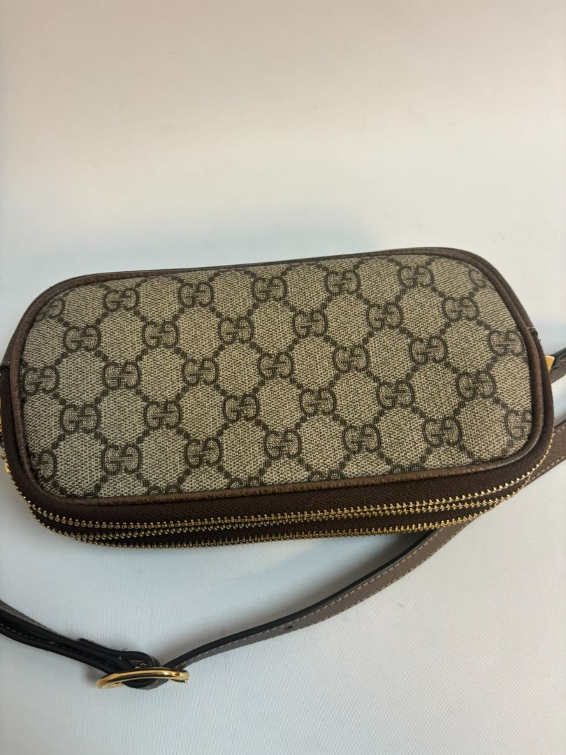 monogram GUCCI Ophidia Supreme small crossbody, Length: 7.5 in Height: 5 in Depth: 2.5 in Strap Drop: 22 in (adjustable crossbody length)