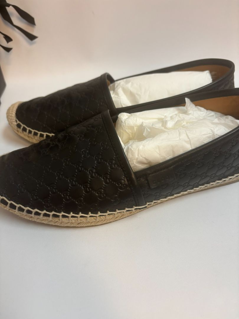 black Gucci matelese shoes, Length: 10 in Heel Height: 0.6 in (flat jute sole) Width: 3.5 in Style Fit: Slip-on, structured