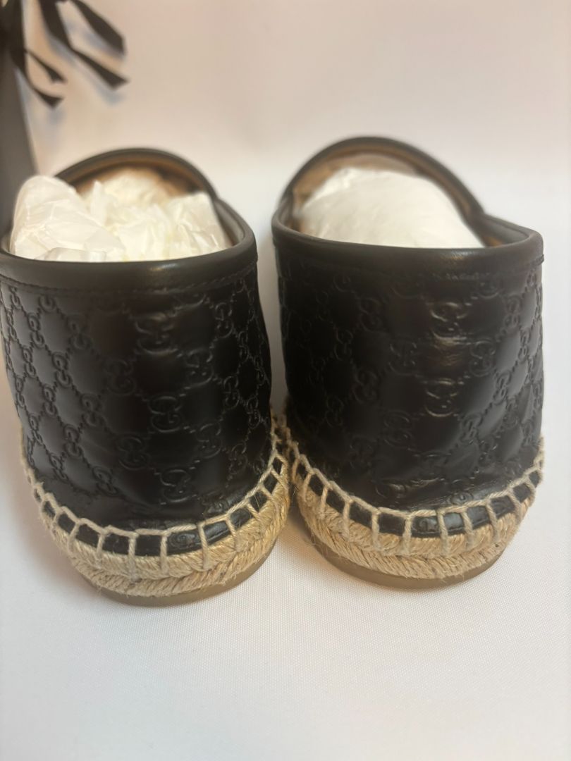 black Gucci matelese shoes, Length: 10 in Heel Height: 0.6 in (flat jute sole) Width: 3.5 in Style Fit: Slip-on, structured