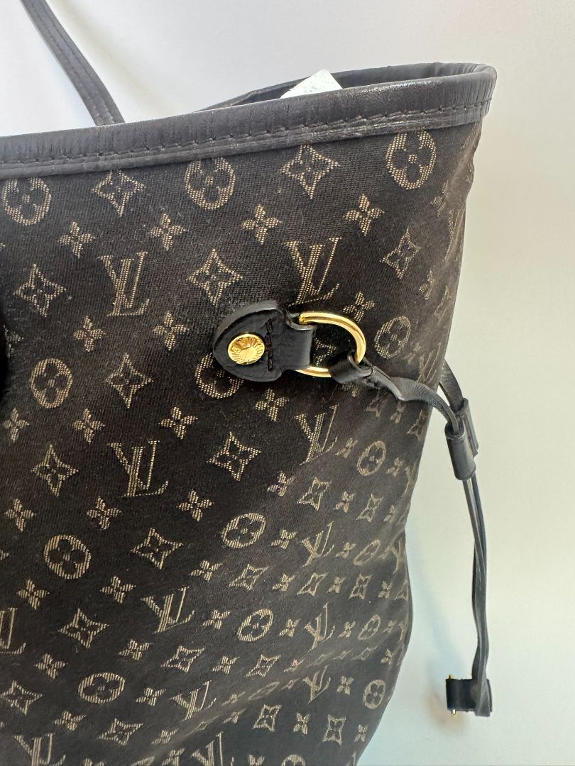 brown Louis Vuitton Mini Lin Monogram Tote โ Rare Discontinued Style (Cabas Sac), Height: 13 in Depth: 6.5 in Handle Drop: 8.5 in (Note: These measurements align with the Mini Lin or Idylle Cabas tote sizing.)