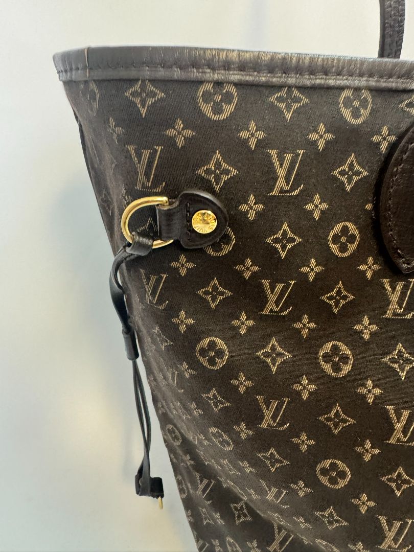 brown Louis Vuitton Mini Lin Monogram Tote โ Rare Discontinued Style (Cabas Sac), Height: 13 in Depth: 6.5 in Handle Drop: 8.5 in (Note: These measurements align with the Mini Lin or Idylle Cabas tote sizing.)