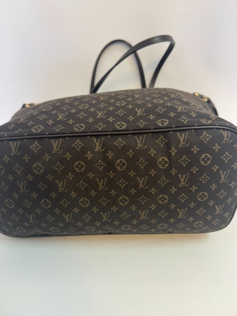 brown Louis Vuitton Mini Lin Monogram Tote โ Rare Discontinued Style (Cabas Sac), Height: 13 in Depth: 6.5 in Handle Drop: 8.5 in (Note: These measurements align with the Mini Lin or Idylle Cabas tote sizing.)