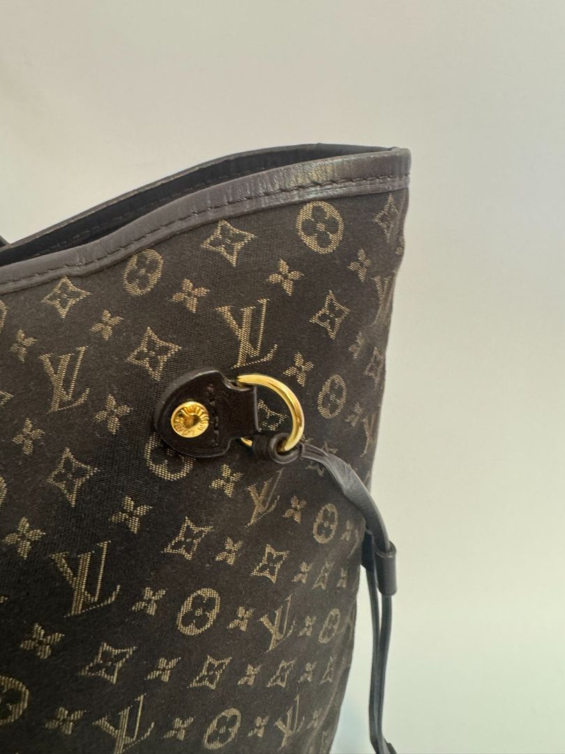 brown Louis Vuitton Mini Lin Monogram Tote โ Rare Discontinued Style (Cabas Sac), Height: 13 in Depth: 6.5 in Handle Drop: 8.5 in (Note: These measurements align with the Mini Lin or Idylle Cabas tote sizing.)