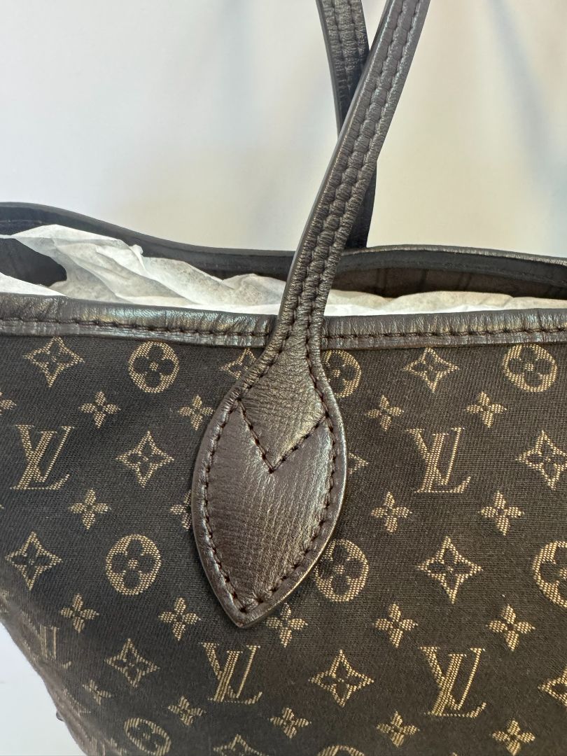 brown Louis Vuitton Mini Lin Monogram Tote โ Rare Discontinued Style (Cabas Sac), Height: 13 in Depth: 6.5 in Handle Drop: 8.5 in (Note: These measurements align with the Mini Lin or Idylle Cabas tote sizing.)
