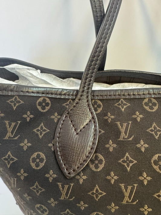 brown Louis Vuitton Mini Lin Monogram Tote – Rare Discontinued Style (Cabas Sac), Height: 13 in Depth: 6.5 in Handle Drop: 8.5 in (Note: These measurements align with the Mini Lin or Idylle Cabas tote sizing.)