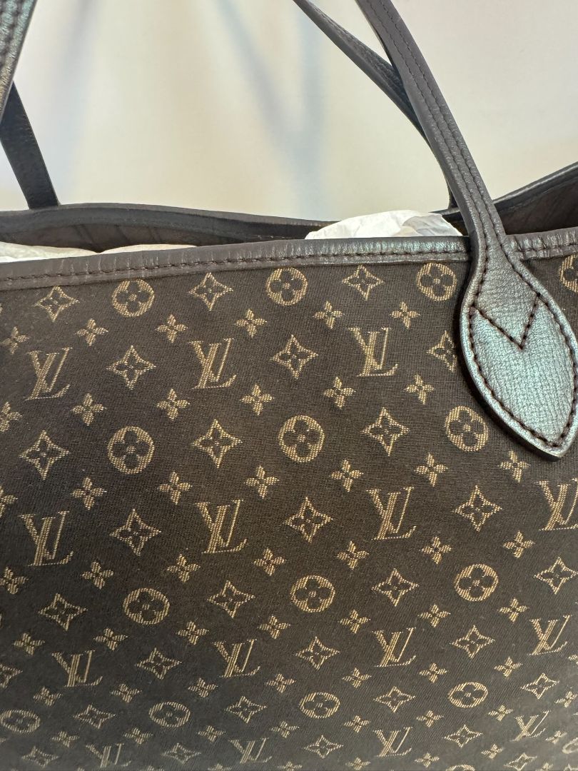 brown Louis Vuitton Mini Lin Monogram Tote โ Rare Discontinued Style (Cabas Sac), Height: 13 in Depth: 6.5 in Handle Drop: 8.5 in (Note: These measurements align with the Mini Lin or Idylle Cabas tote sizing.)