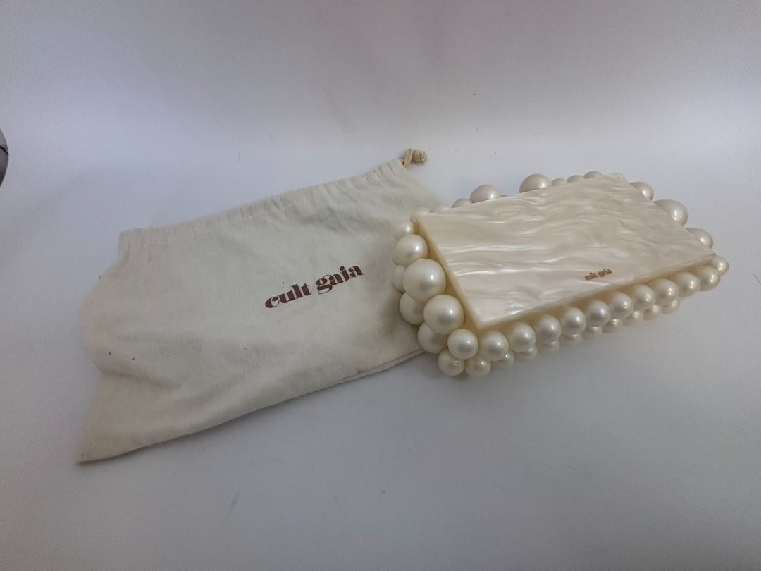 pearl Cult Gaia EOS pearl acrylic clutch, Width: 7.5 inches Height: 5 inches Depth: 2 inches