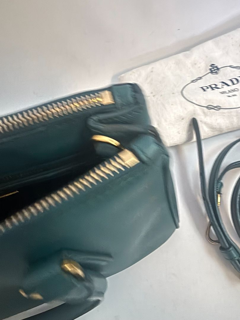 deep teal Prada Model: Double Zip Lux Tote (also known as Galleria Tote), Width: 11.5 inches (29 cm) Height: 8 inches (20 cm) Depth: 5 inches (13 cm) Handle Drop: 4 inches (10 cm) Strap Drop: 19–21 inches adjustable (48–53 cm)