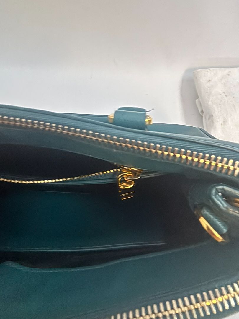 deep teal Prada Model: Double Zip Lux Tote (also known as Galleria Tote), Width: 11.5 inches (29 cm) Height: 8 inches (20 cm) Depth: 5 inches (13 cm) Handle Drop: 4 inches (10 cm) Strap Drop: 19–21 inches adjustable (48–53 cm)