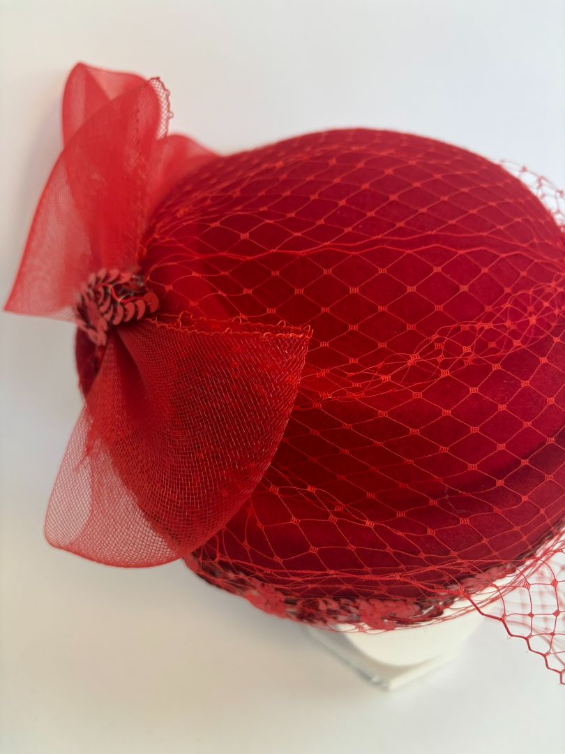 red NA women's hat, 8 x 8