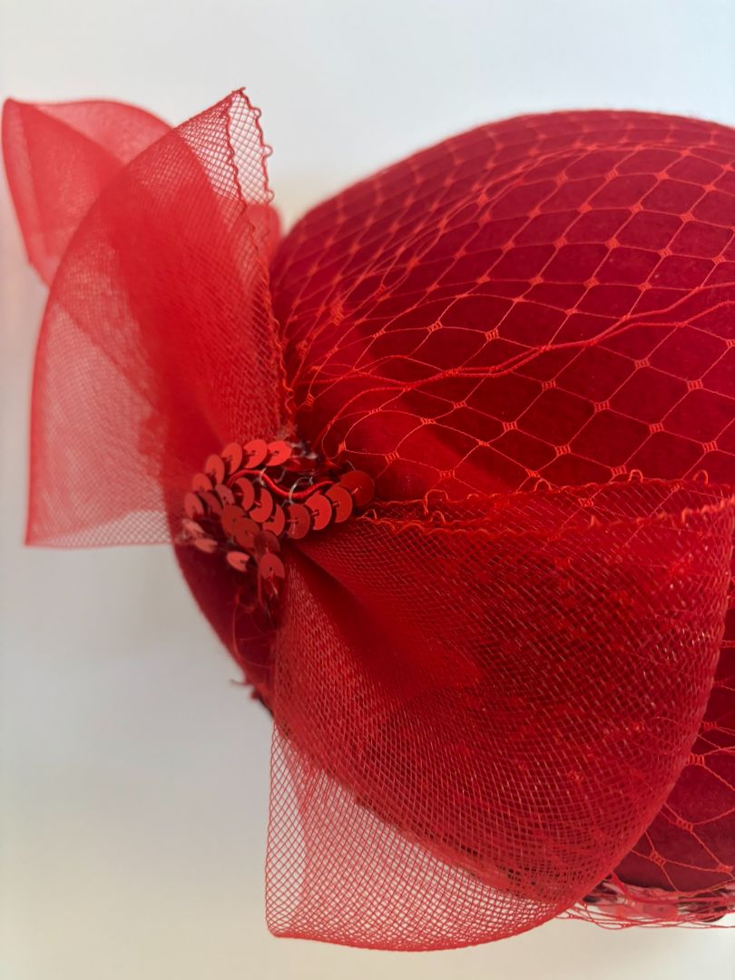 red NA women's hat, 8 x 8