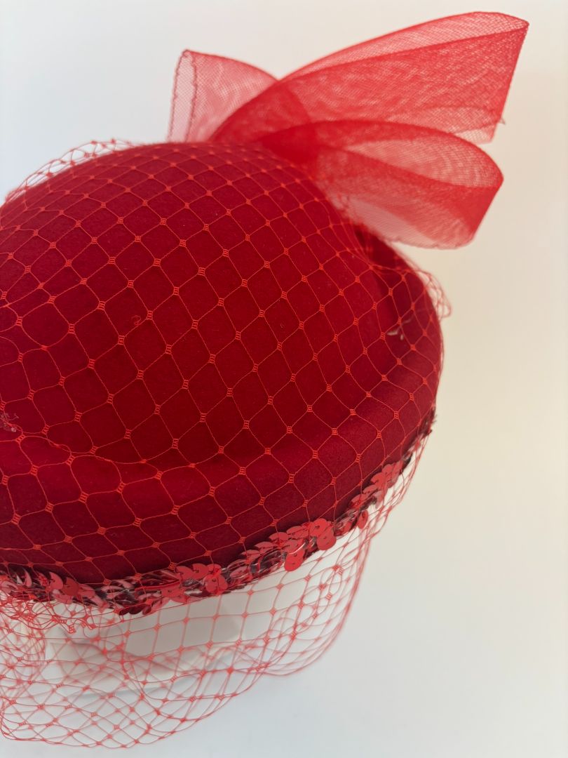 red NA women's hat, 8 x 8