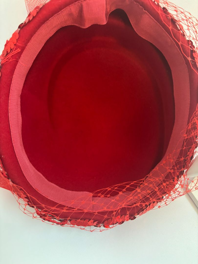 red NA women's hat, 8 x 8
