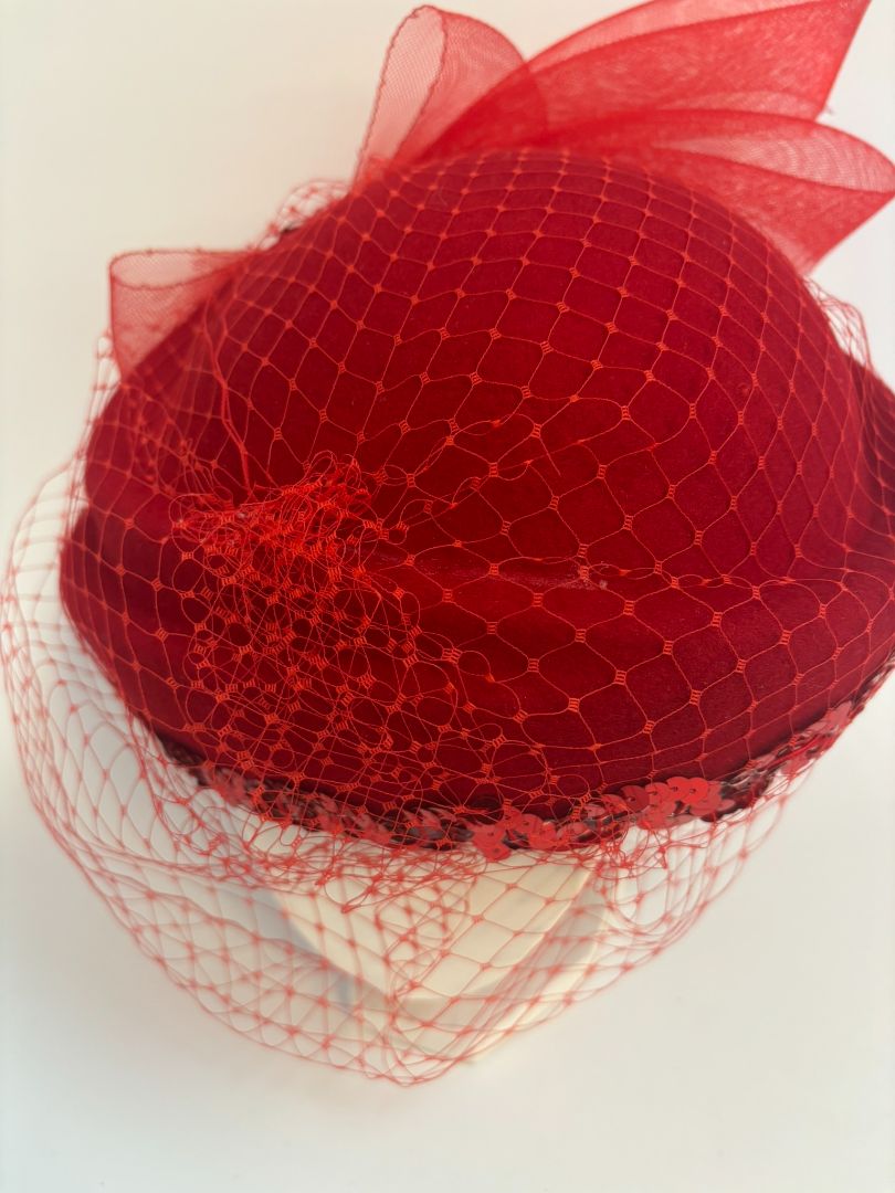 red NA women's hat, 8 x 8