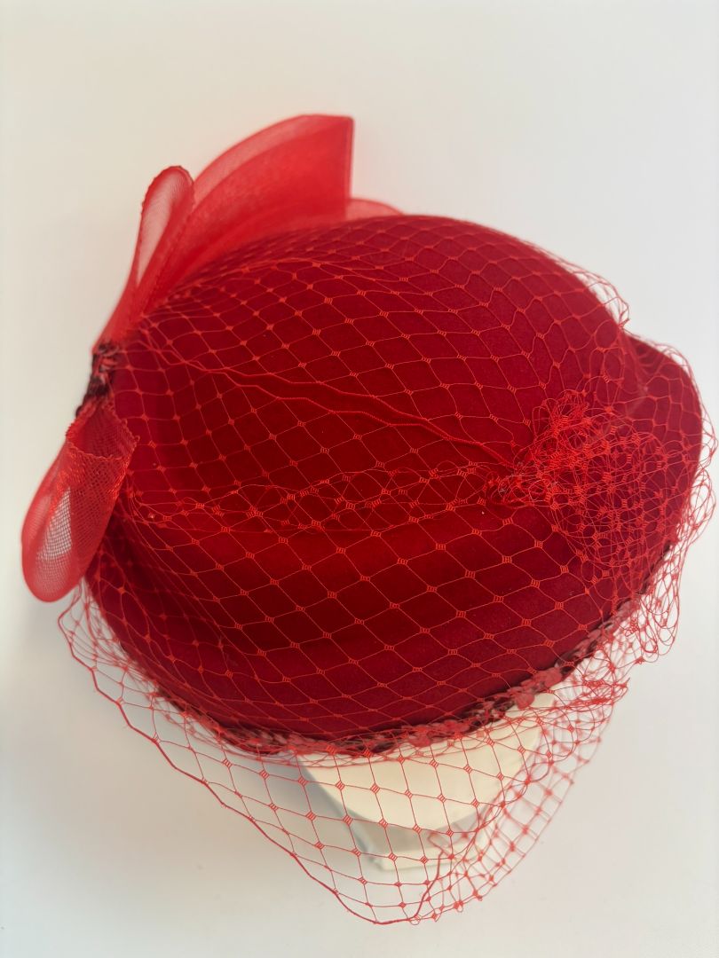 red NA women's hat, 8 x 8