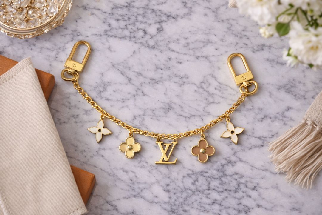 gold Louis Vuitton bag chain extender