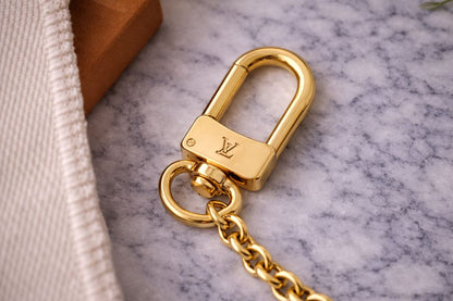 gold Louis Vuitton bag chain extender
