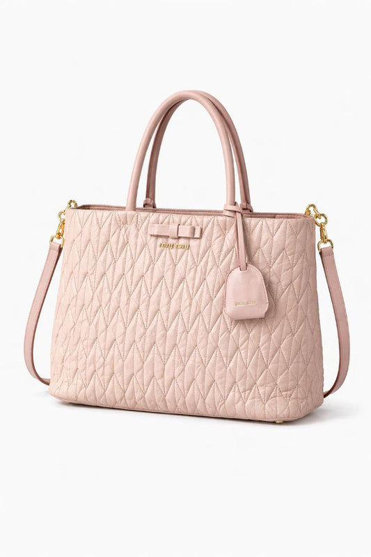 blush Miu Miu Matelasse Leather tote with bow detail and shoulder strap