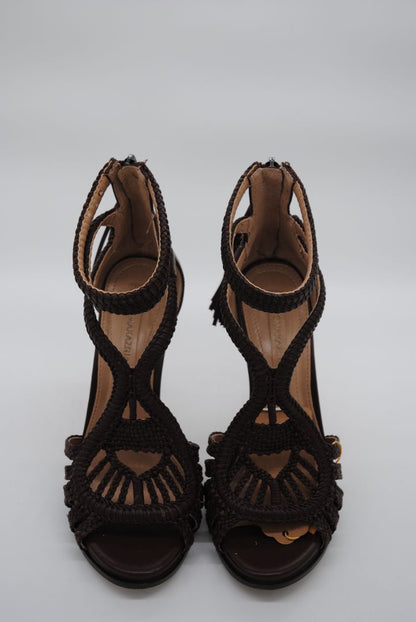 BCBG Max Azria strappy tassel heels with open toe.