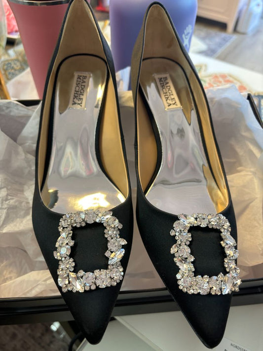 Badgley Mischka black satin pumps with crystal embellishments and pointed toe, high heel, new with tags, size 9.5.
