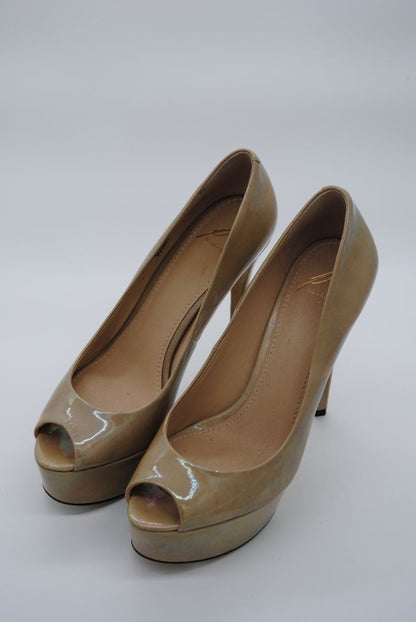 Side view of tan designer high heels with platform sole