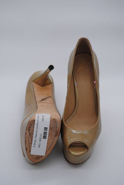 Designer tan platform pumps with high heel