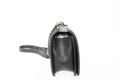 black Chanel Chanel Boy Bag, 📏 Dimensions (Approximate)    • Size: Medium    • Length: 9.8 in    • Height: 5.9 in    • Depth: 3.5 in    • Strap Drop (Single Chain): 11–12 in    • Strap Drop (Crossbody): ~20 in    • Style Code: A67086 (based on signature f