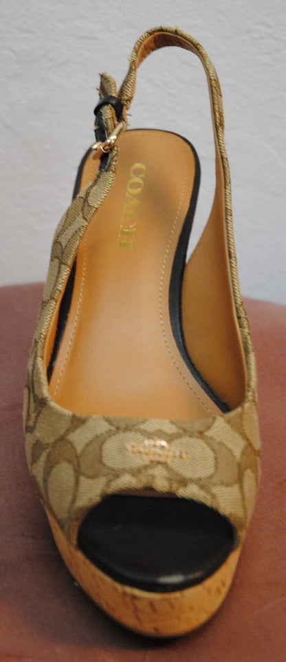 Coach Women's Tan Insignia Ferry Peep Toe Wedge Heels in Size 8.5B, featuring a leather upper, open toe design, and wedge heel with signature Coach logo detailing.